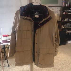 1980’s Woolrich Woman mountain parka - tan with blue plaid lining.